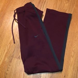 Maroon and grey nike sweatpants